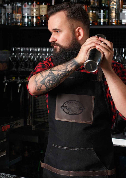 Man in Creekstone Farms Leather Patch Apron