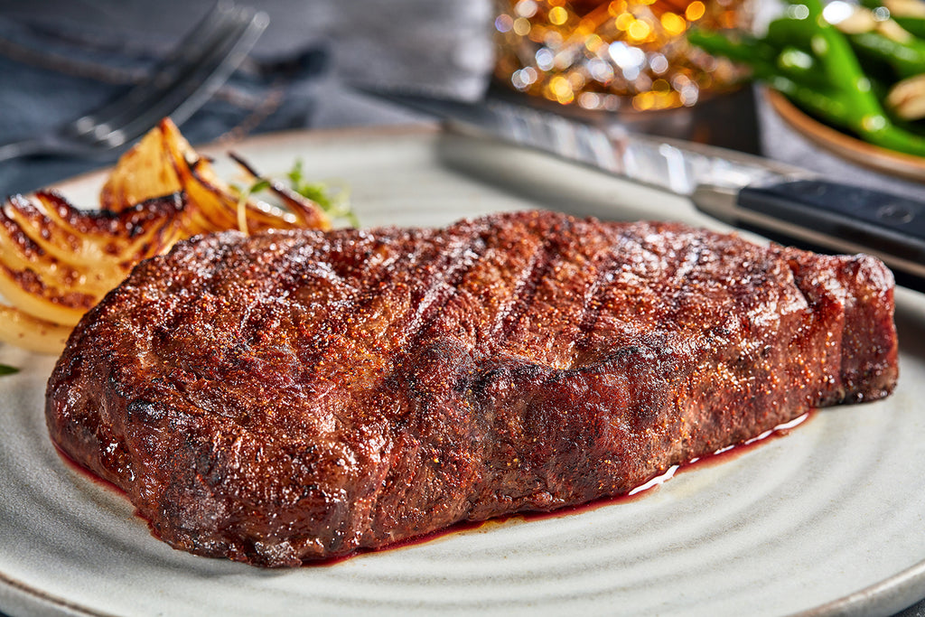 Boneless Ribeye with Caramelized Bourbon Onions